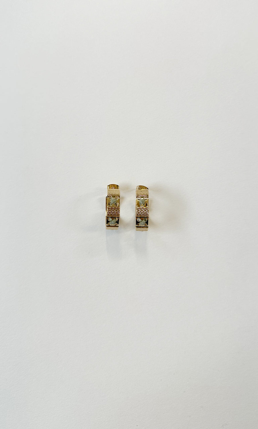 Plümo- Ivana Hoops: Small handcrafted gold hoops with rectangular geometric design and embedded stones on white background.