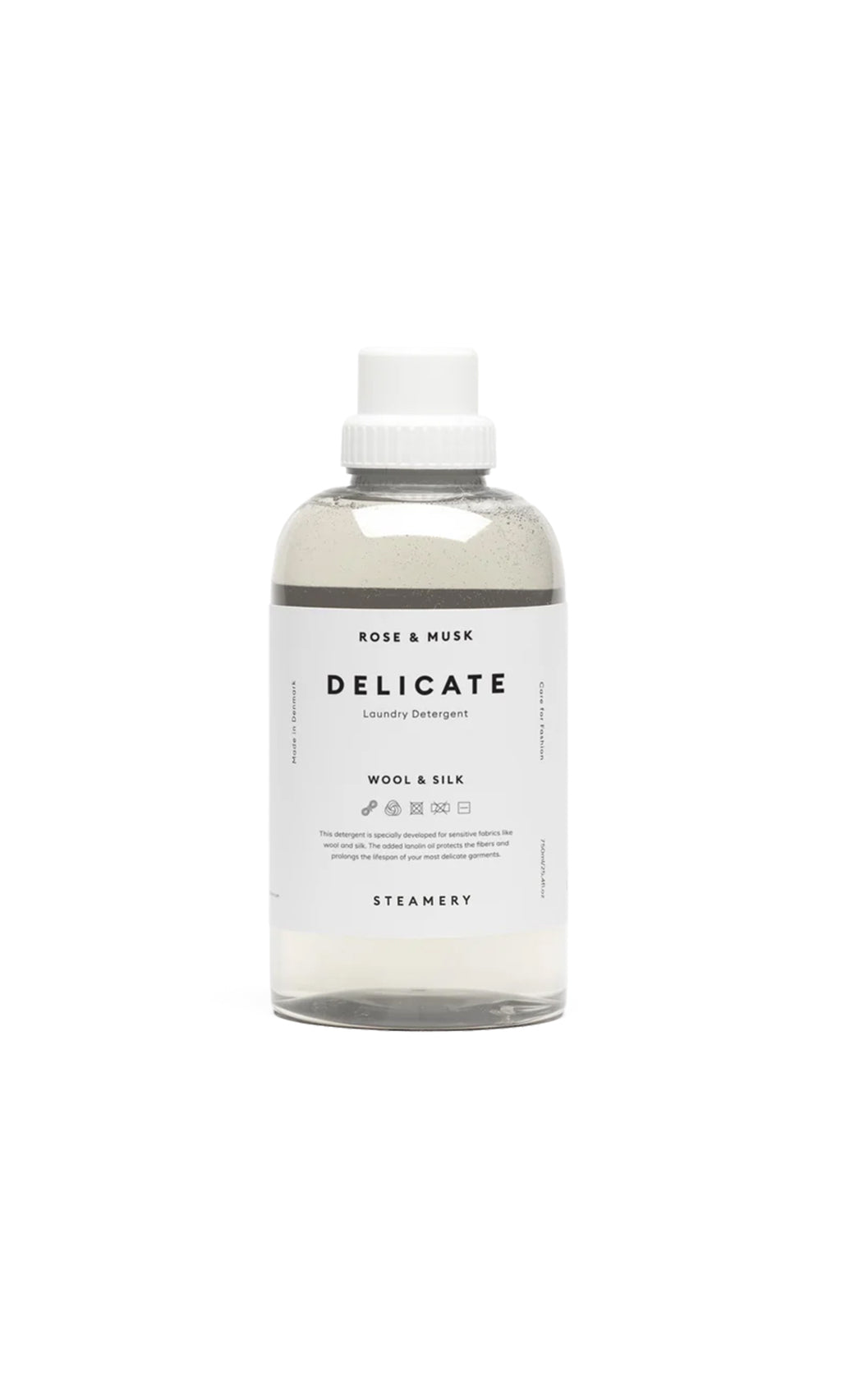 Plümo  Delicate Laundry Liquid in a clear bottle with white label and cap, designed for delicate fabrics; shown on white background.