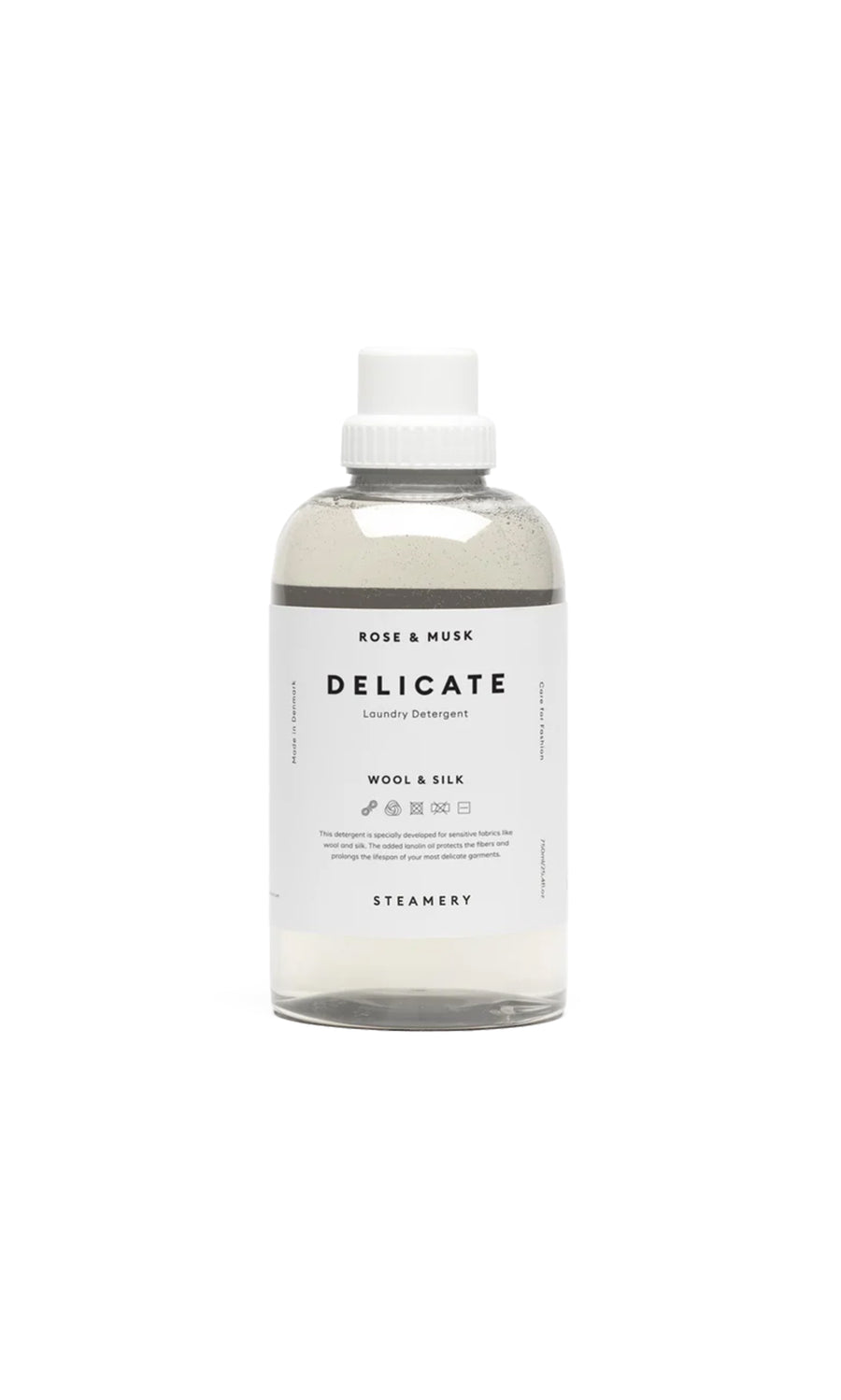 Plümo  Delicate Laundry Liquid in a clear bottle with white label and cap, designed for delicate fabrics; shown on white background.